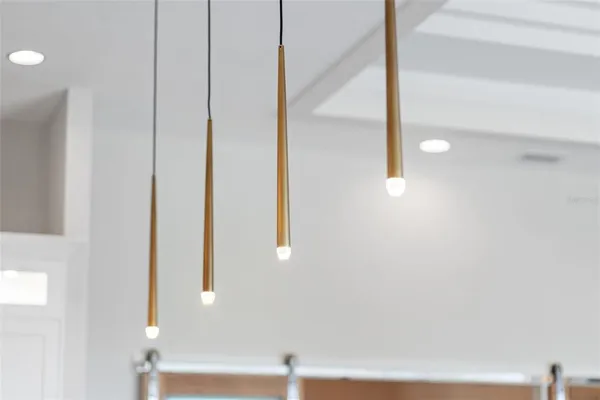 a bedroom with a bed and a night stand