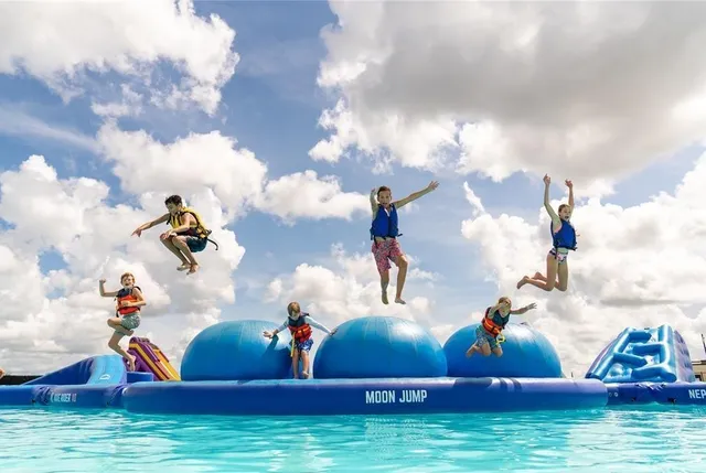 an aerial view of a house with outdoor space