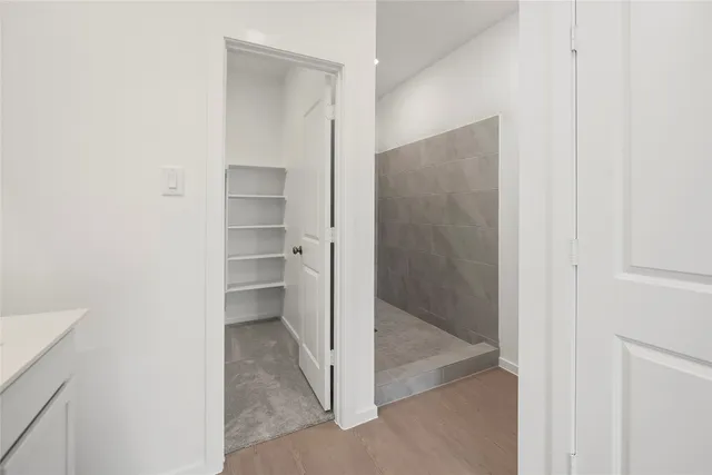 a view of an empty walk in closet