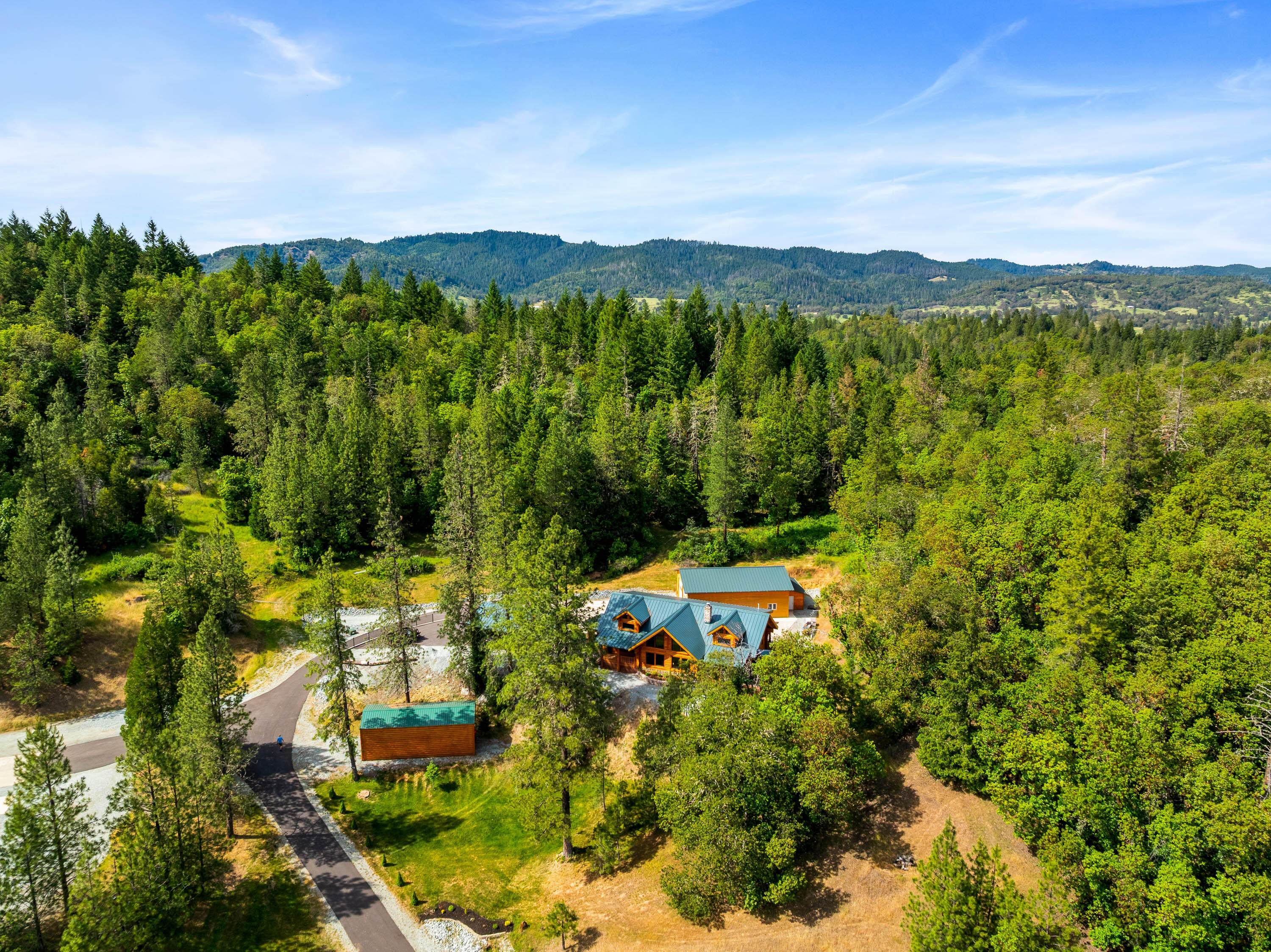 225 Eagle Ridge Road Canyonville, OR 97417 - Photo 2 of 52 a view of outdoor space and mountain view