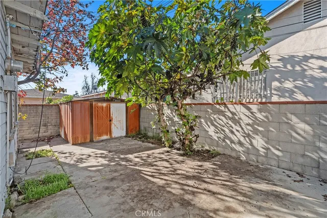 a view of a wooden fence