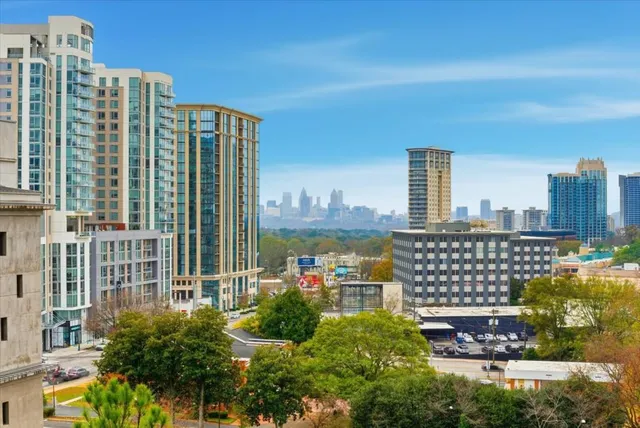 a view of a city with tall buildings