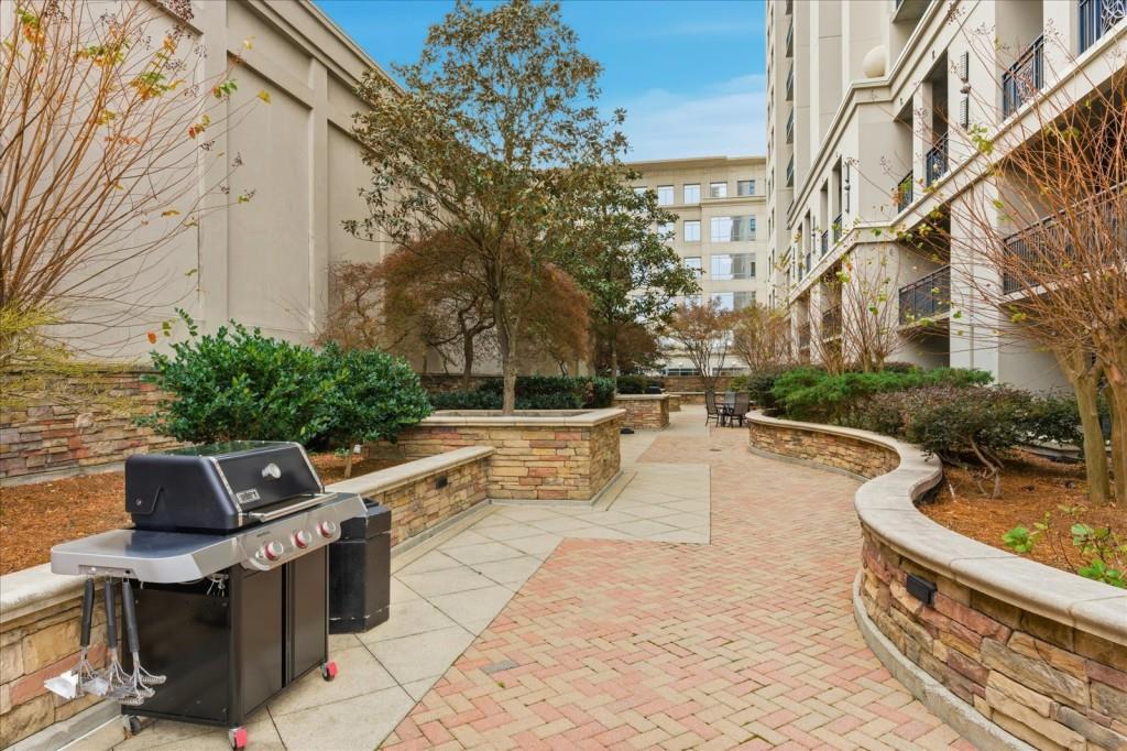 3040 Peachtree Road Northwest, Unit 805 Atlanta, GA 30305 - Photo 30 of 36 a view of outdoor space yard swimming pool and seating