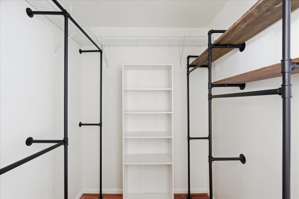 3040 Peachtree Road Northwest, Unit 805 Atlanta, GA 30305 - Photo 7 of 36 a view of a hallway with closet and window