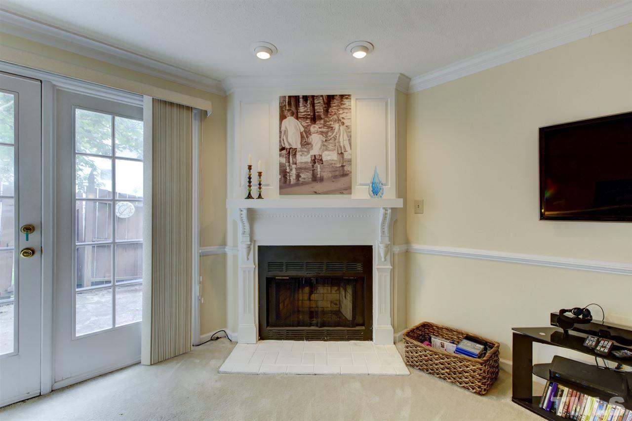 5620 Split Oak Way Raleigh, NC 27609 - Photo 13 of 24 Lovely corner fireplace in family room