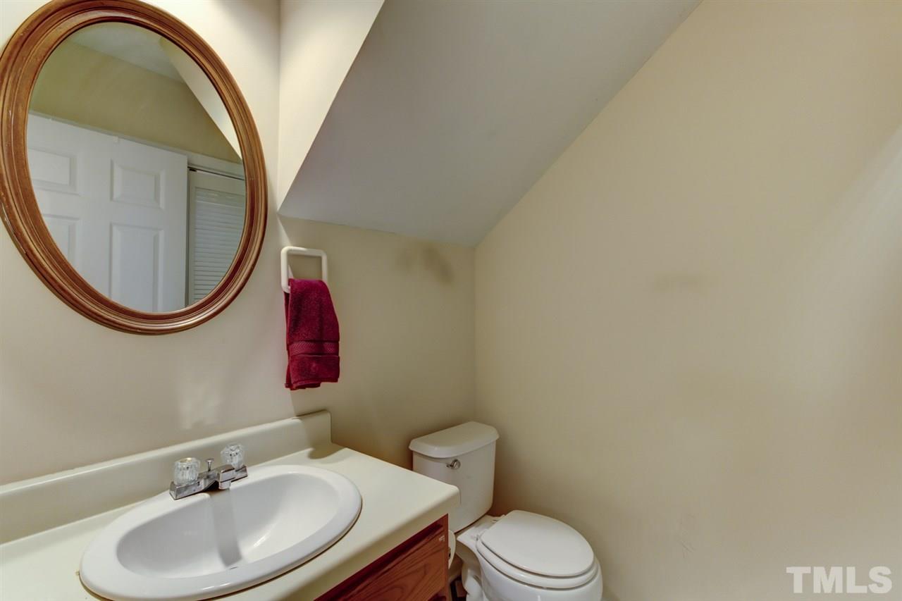 5620 Split Oak Way Raleigh, NC 27609 - Photo 14 of 24 First Floor half bath