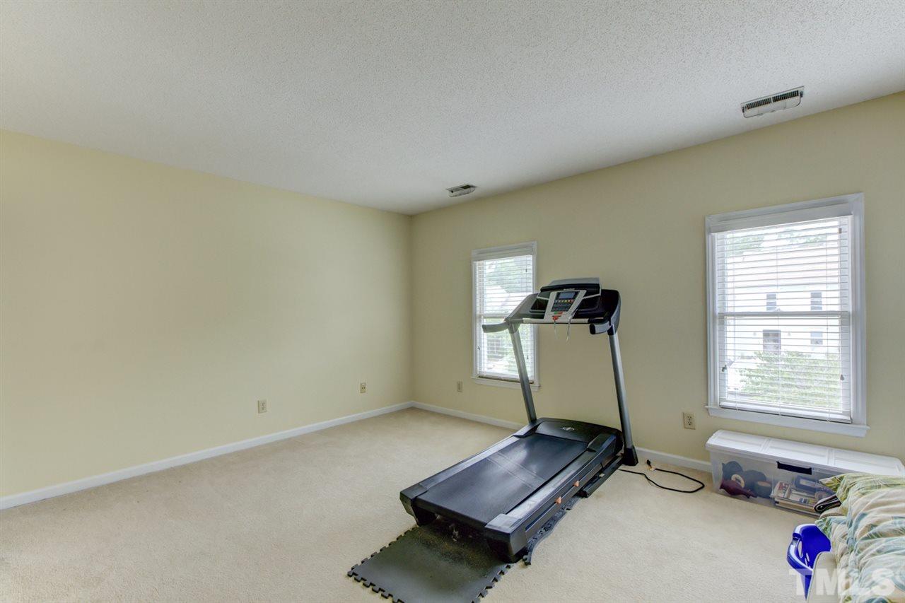 5620 Split Oak Way Raleigh, NC 27609 - Photo 19 of 24 Second bedroom with en suite bathroom