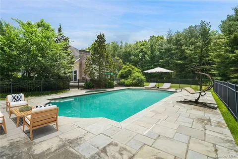 a view of a terrace with chairs