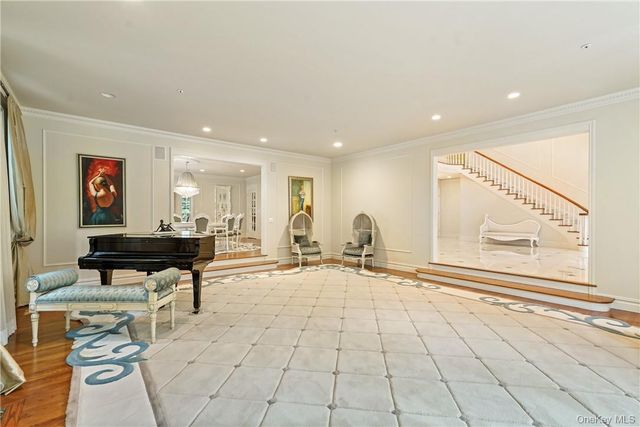 a living room with furniture and a table