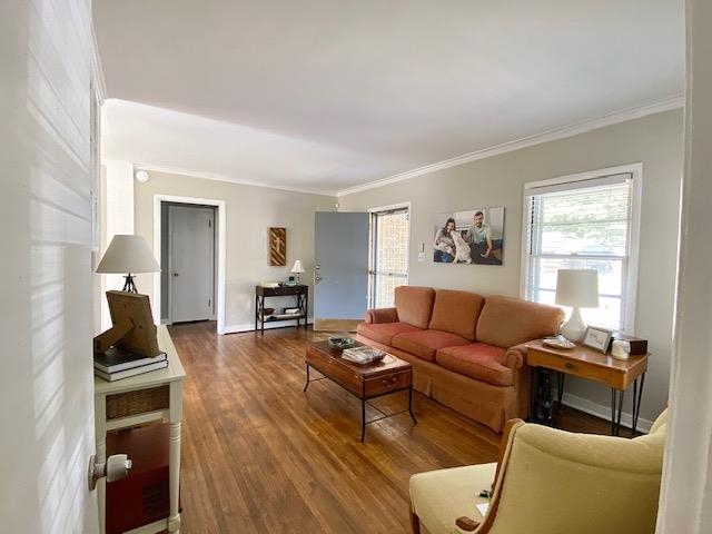 4787 Flamingo Road Memphis, TN 38117 - Photo 2 of 18 a living room with furniture and a wooden floor
