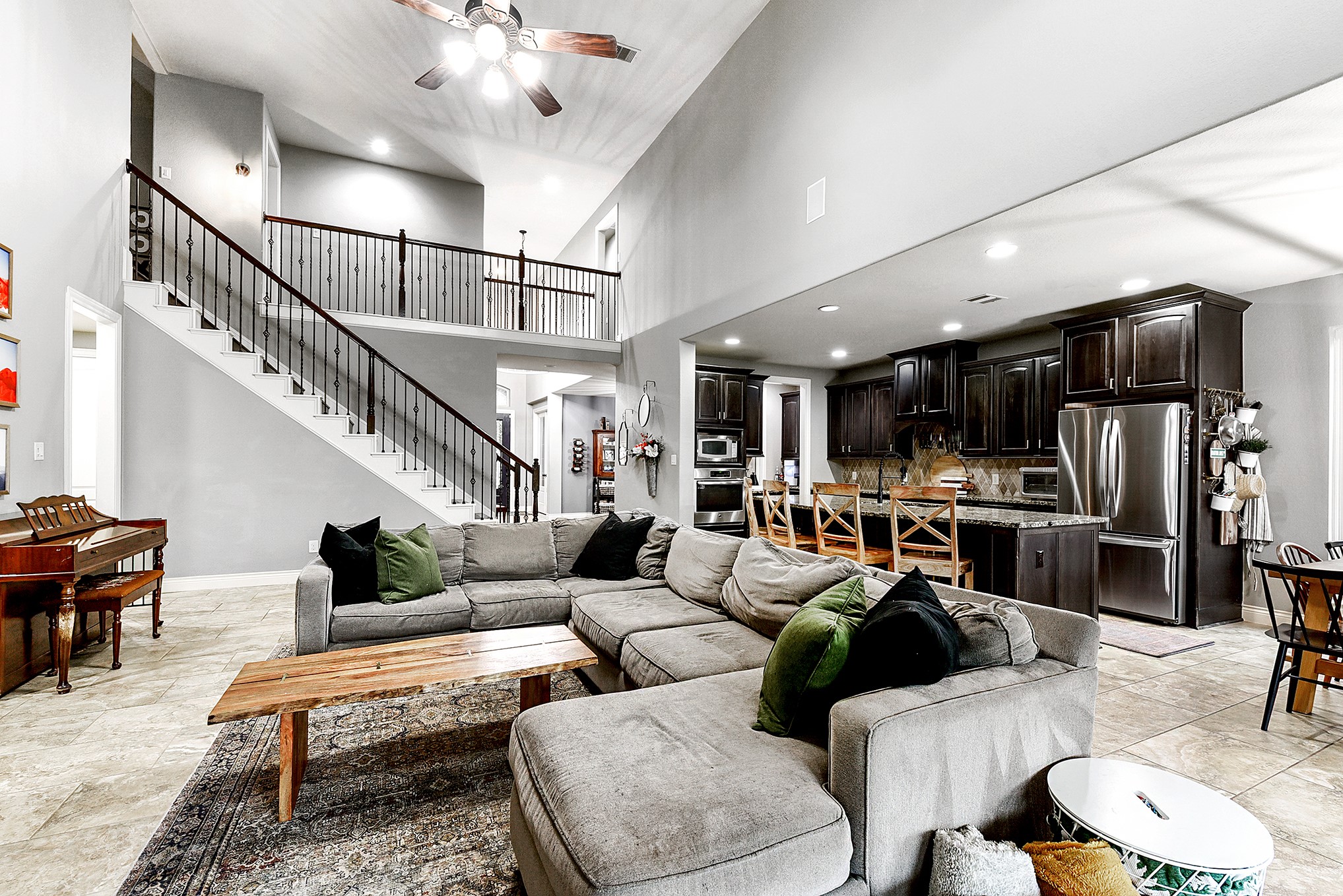 2939 Bobby Jones Road Katy, TX 77494 - Photo 11 of 50 a living room with furniture kitchen view and a chandelier