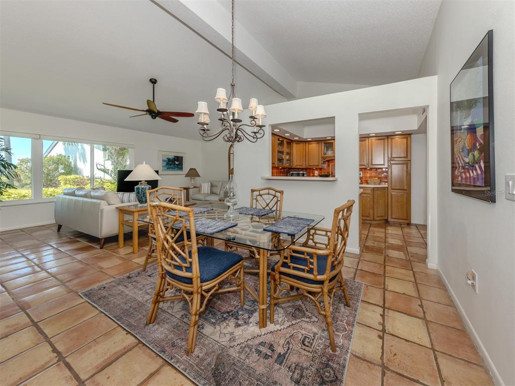 786 Sarabay Road, Unit 19 Osprey, FL 34229 - Photo 15 of 60 a view of a dining room with furniture