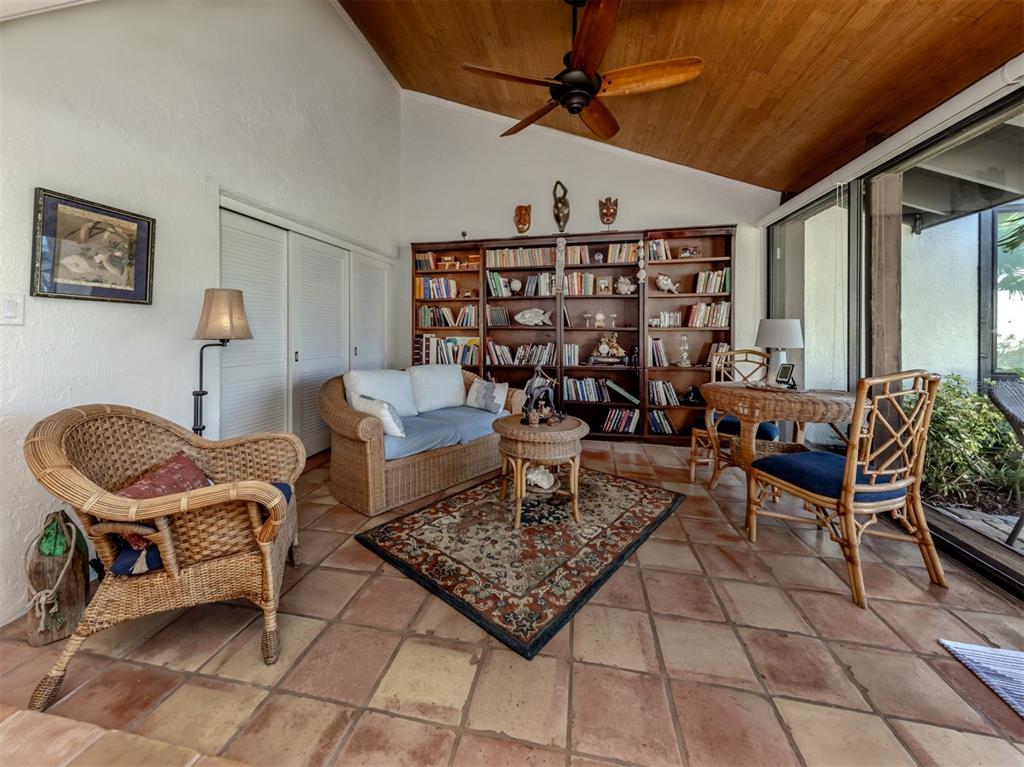 786 Sarabay Road, Unit 19 Osprey, FL 34229 - Photo 24 of 60 a living room with furniture and wooden floor