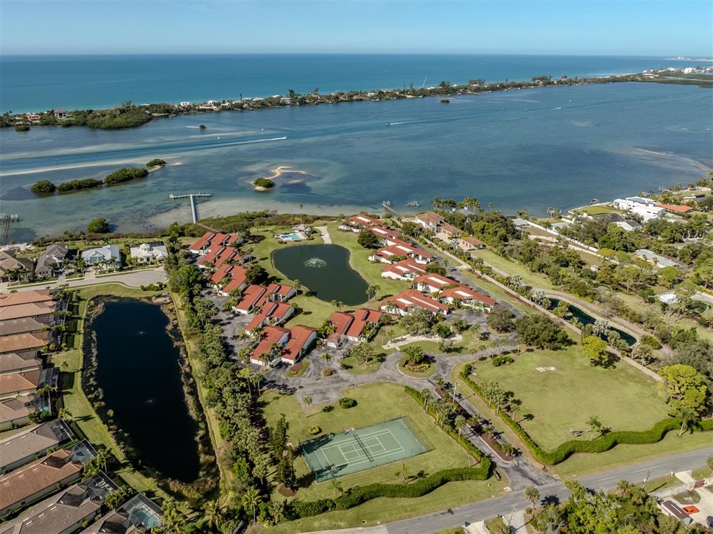 786 Sarabay Road, Unit 19 Osprey, FL 34229 - Photo 58 of 60 a view of a lake with a mountain