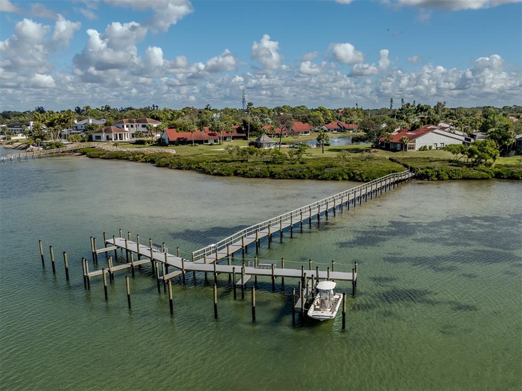 786 Sarabay Road, Unit 19 Osprey, FL 34229 - Photo 7 of 60 an aerial view of a house with a lake view
