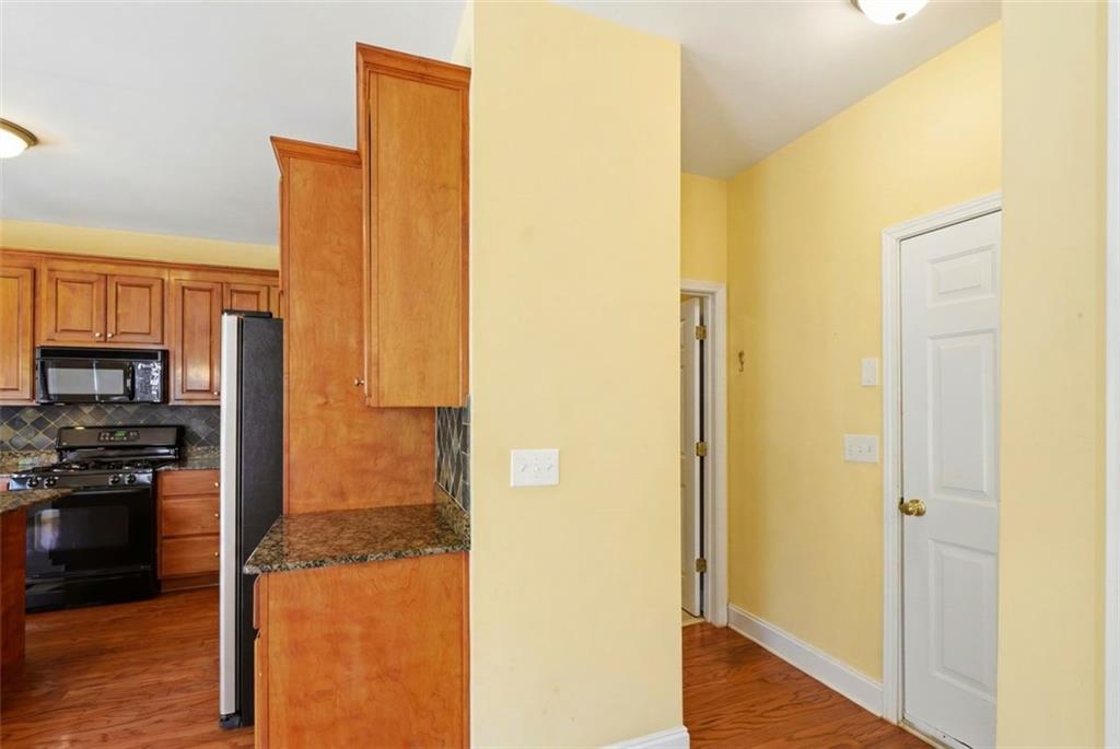 3420 Bulloch Lake Road Loganville, GA 30052 - Photo 25 of 57 a view of a kitchen from the hallway