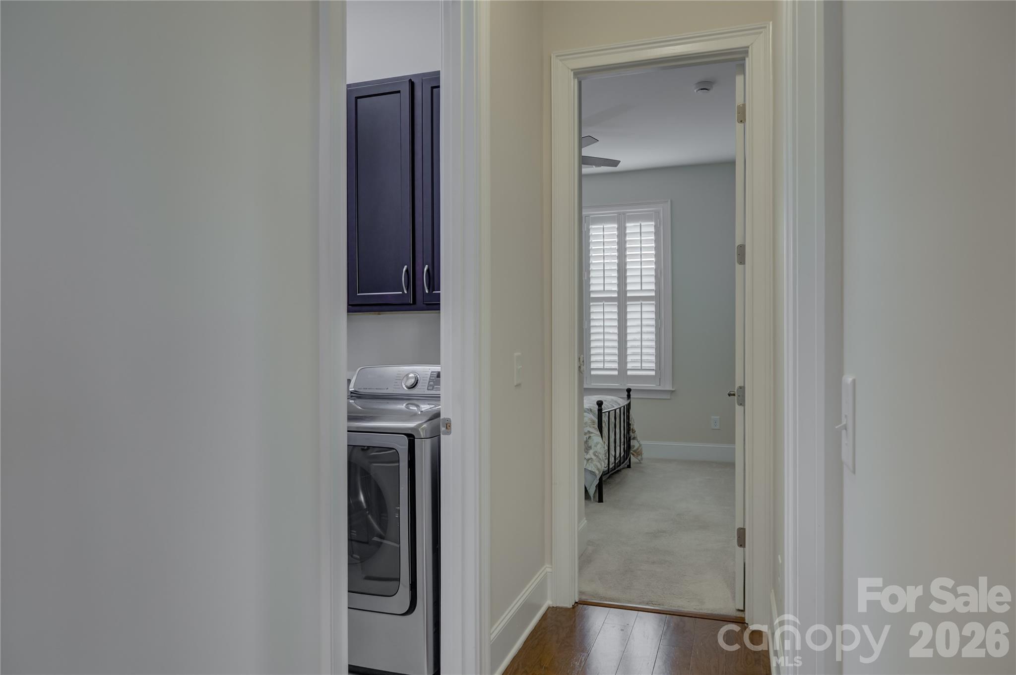15511 Lake Ridge Road Charlotte, NC 28278 - Photo 28 of 46 a bathroom with a walk in closet and a mirror