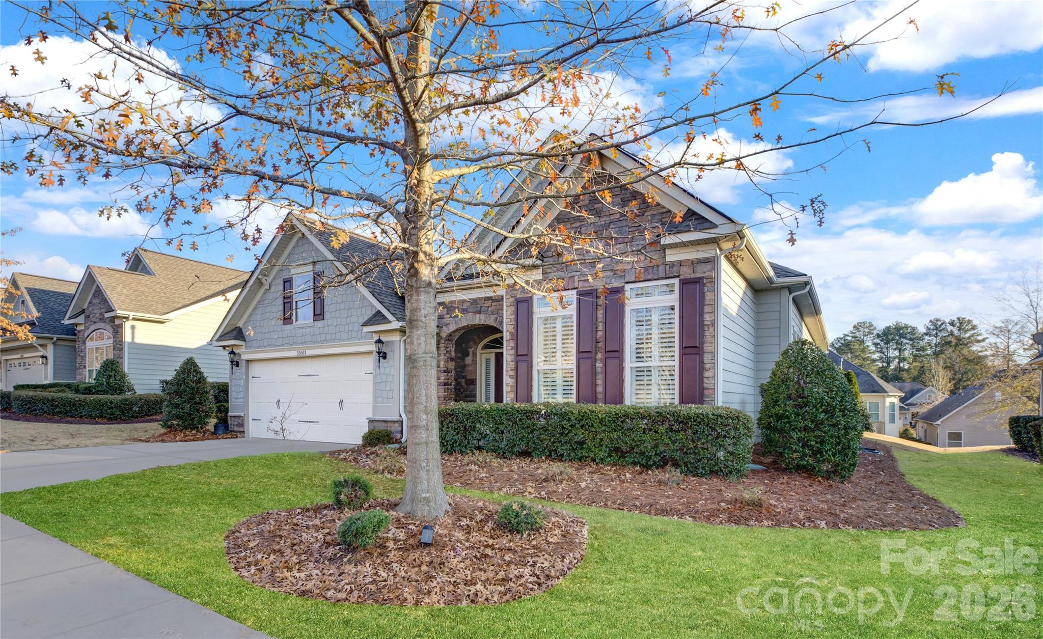 15511 Lake Ridge Road Charlotte, NC 28278 - Photo 39 of 46 a front view of a house with a yard