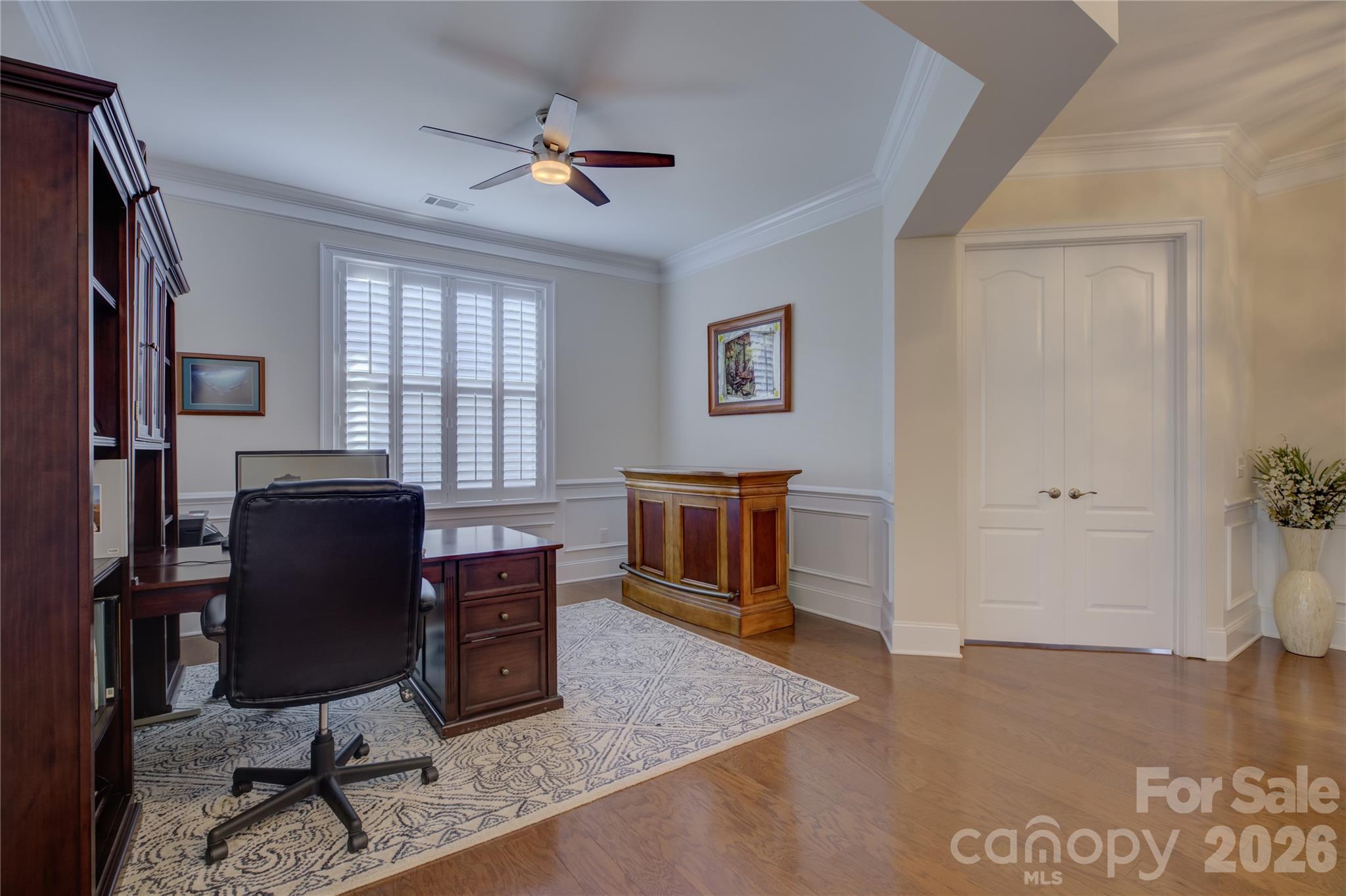 15511 Lake Ridge Road Charlotte, NC 28278 - Photo 8 of 46 a view of a workspace with furniture and a window