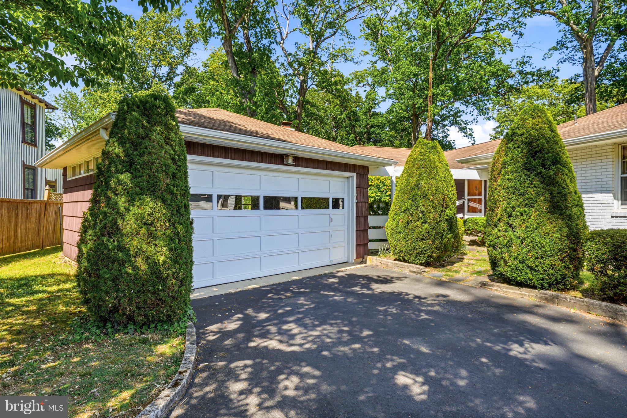 23 Lake Street Bridgeton, NJ 08302 - Photo 13 of 64 Charming curb appeal with lush greenery.