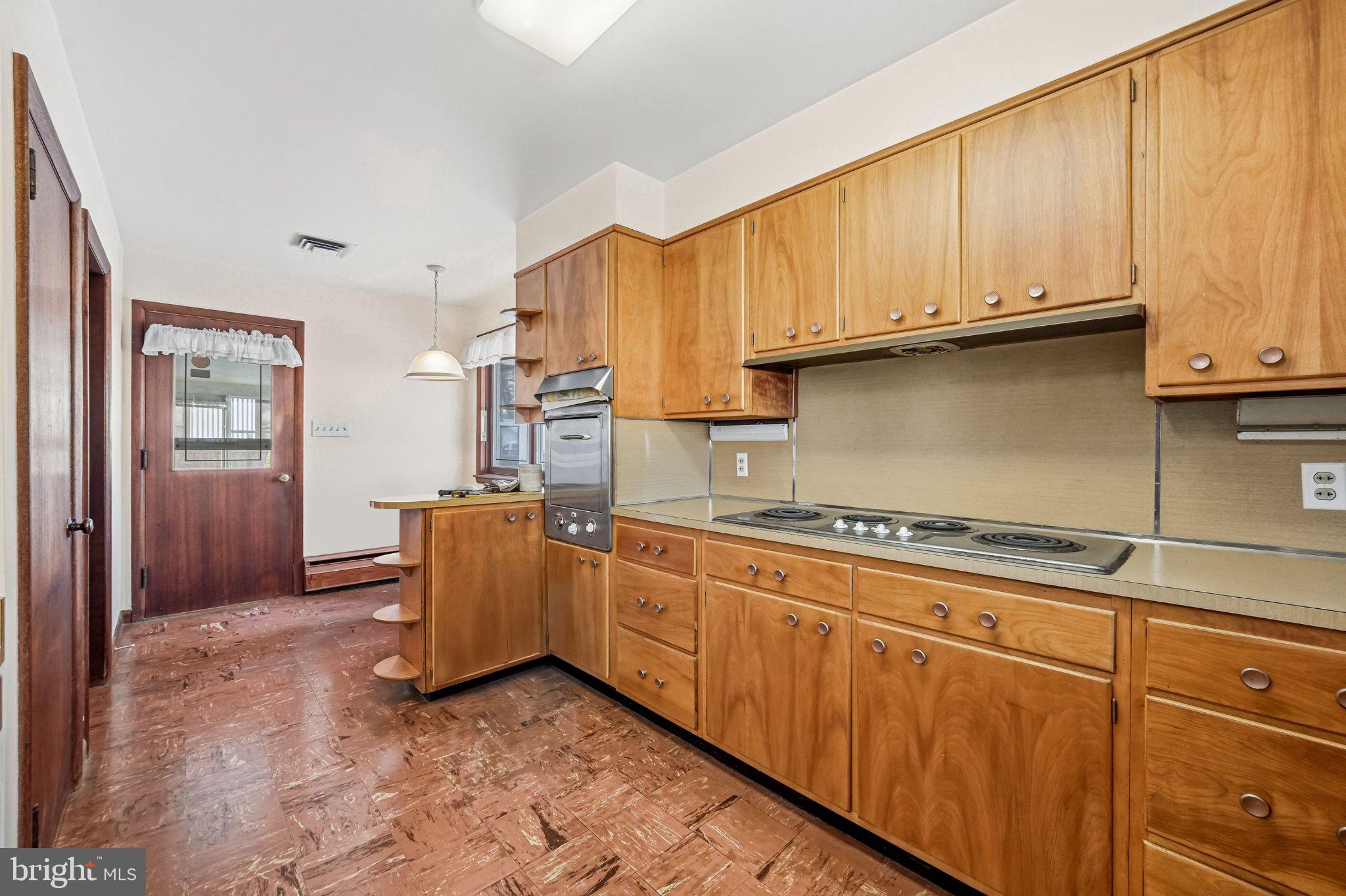 23 Lake Street Bridgeton, NJ 08302 - Photo 28 of 64 Charming kitchen with warm wood tones.