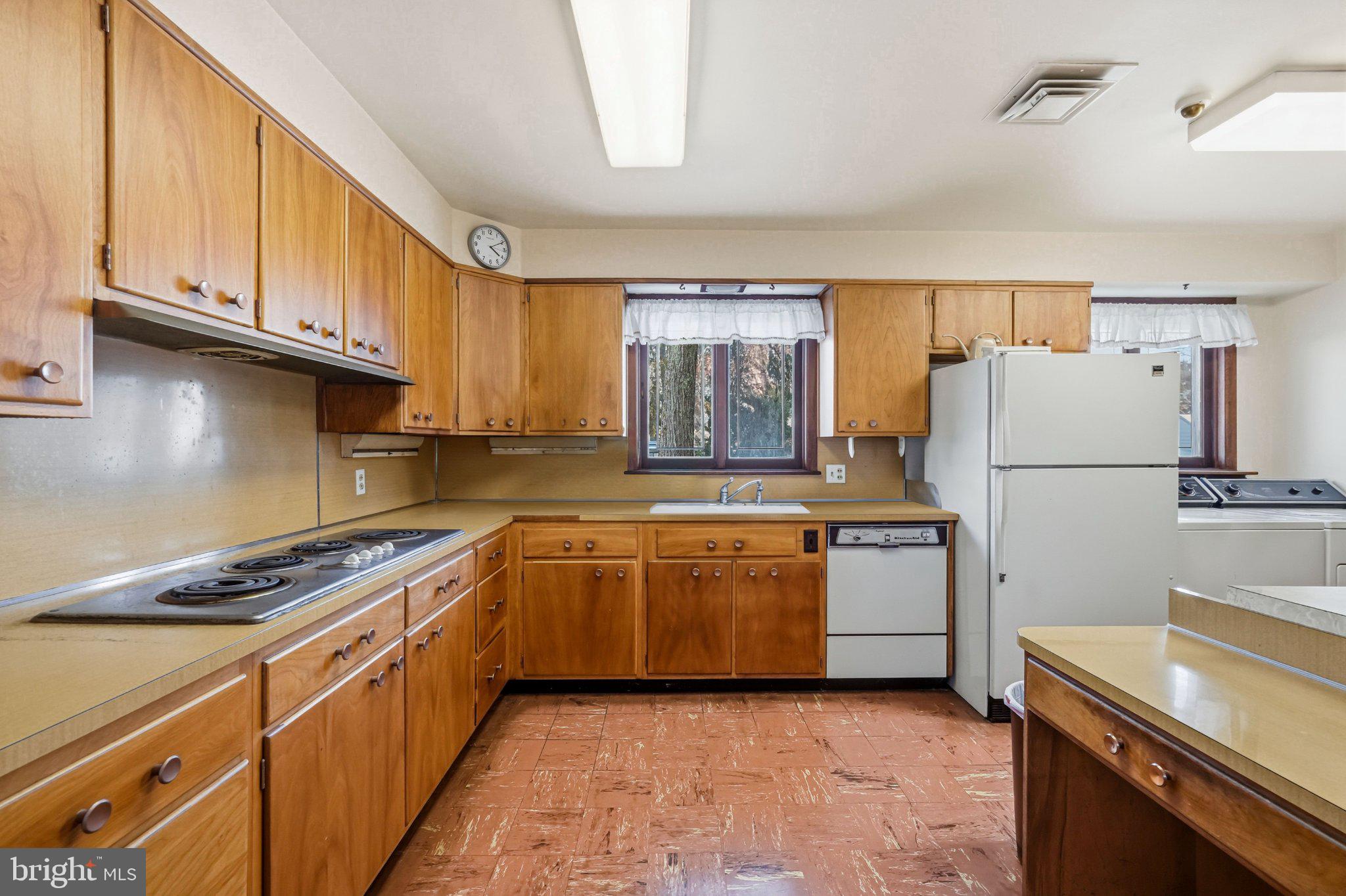 23 Lake Street Bridgeton, NJ 08302 - Photo 29 of 64 Spacious kitchen with warm wood tones.
