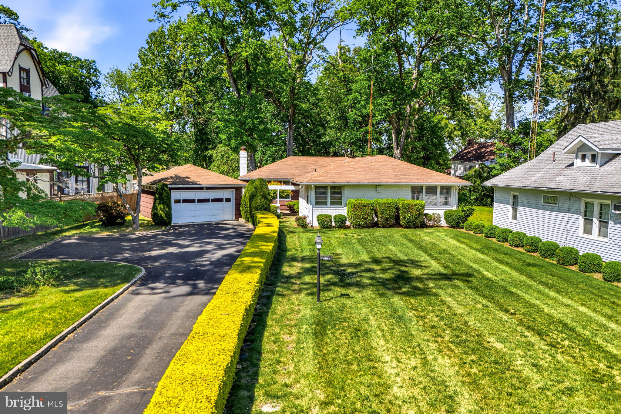 23 Lake Street Bridgeton, NJ 08302 - Photo 3 of 64 Charming home with lush greenery.