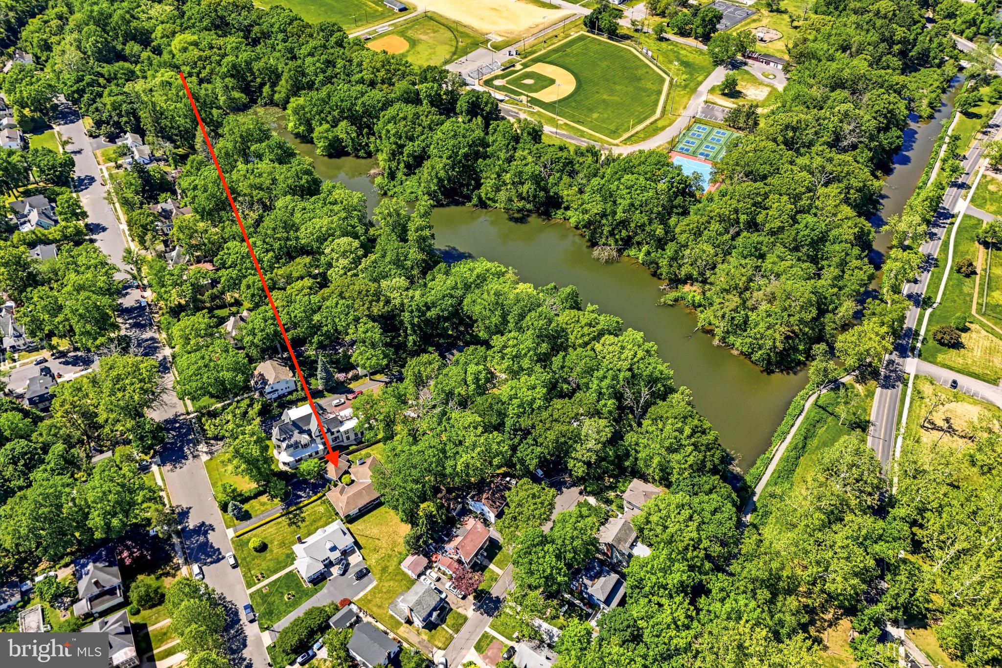 23 Lake Street Bridgeton, NJ 08302 - Photo 4 of 64 Serene riverside retreat in greenery.