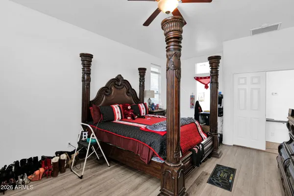 a bathroom with a toilet and shower