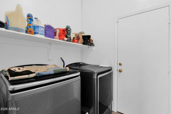 a spacious bathroom with a double vanity sink mirror and