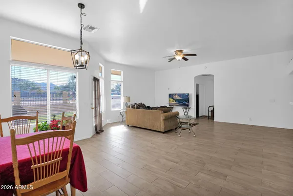 a living room with furniture and a couch