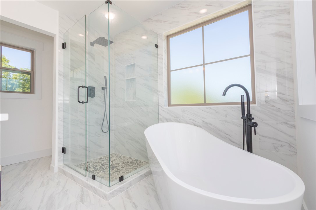 230 Hammond Circle Anderson, SC 29621 - Photo 39 of 48 This serene bathroom offers a spa-like retreat with elegant fixtures and a luminous ambiance.