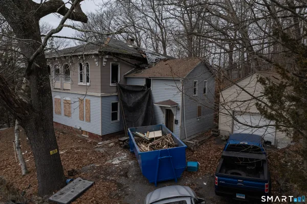 a house with trees in front of it