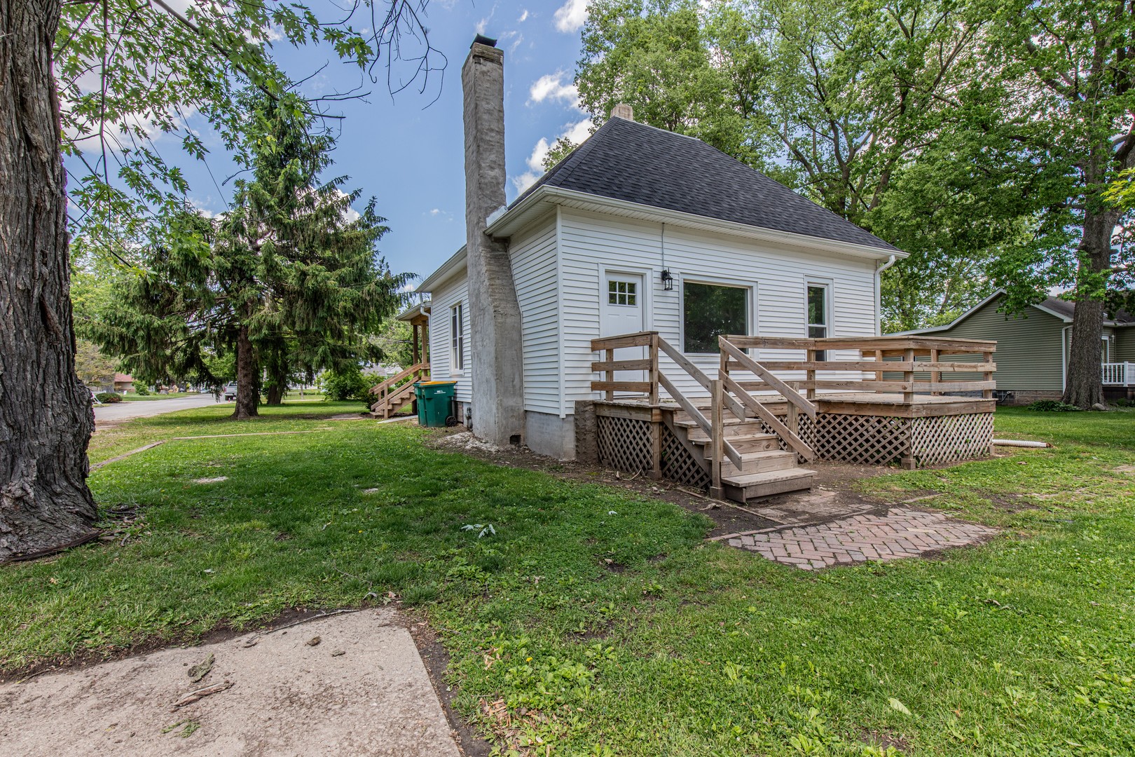 324 Sumner Street Streator, IL 61364 - Photo 1 of 18 a view of a house with a yard and sitting area