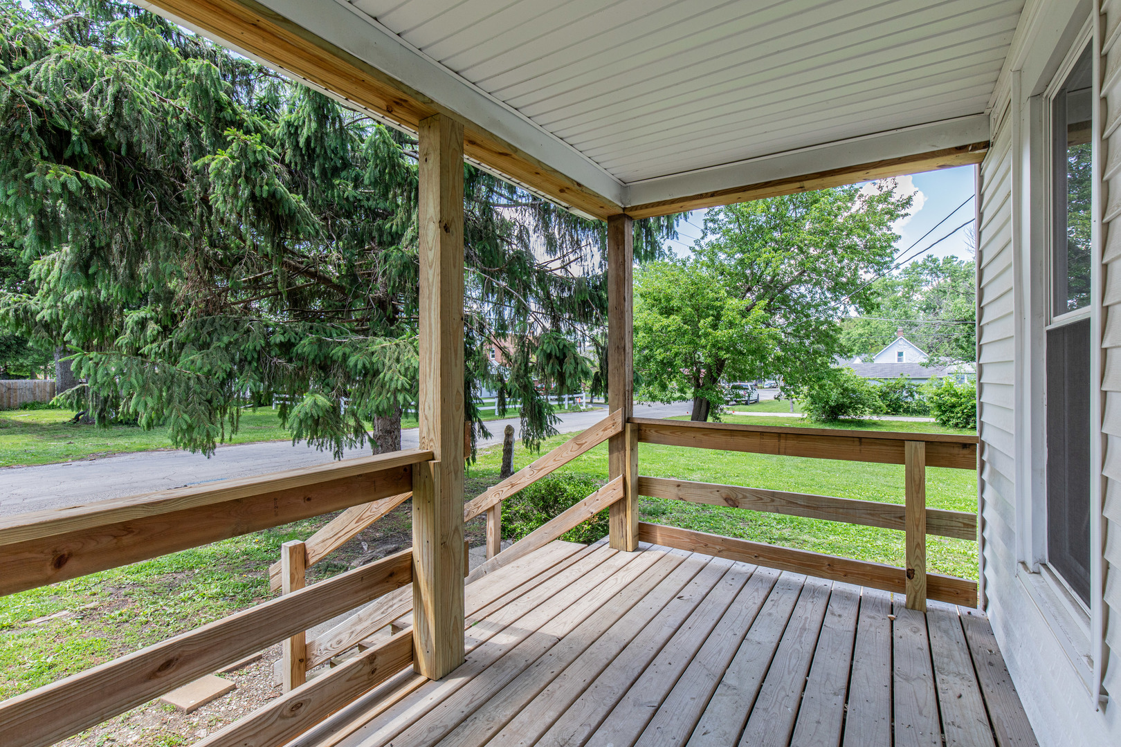 324 Sumner Street Streator, IL 61364 - Photo 4 of 18 a view of a wooden deck with a yard