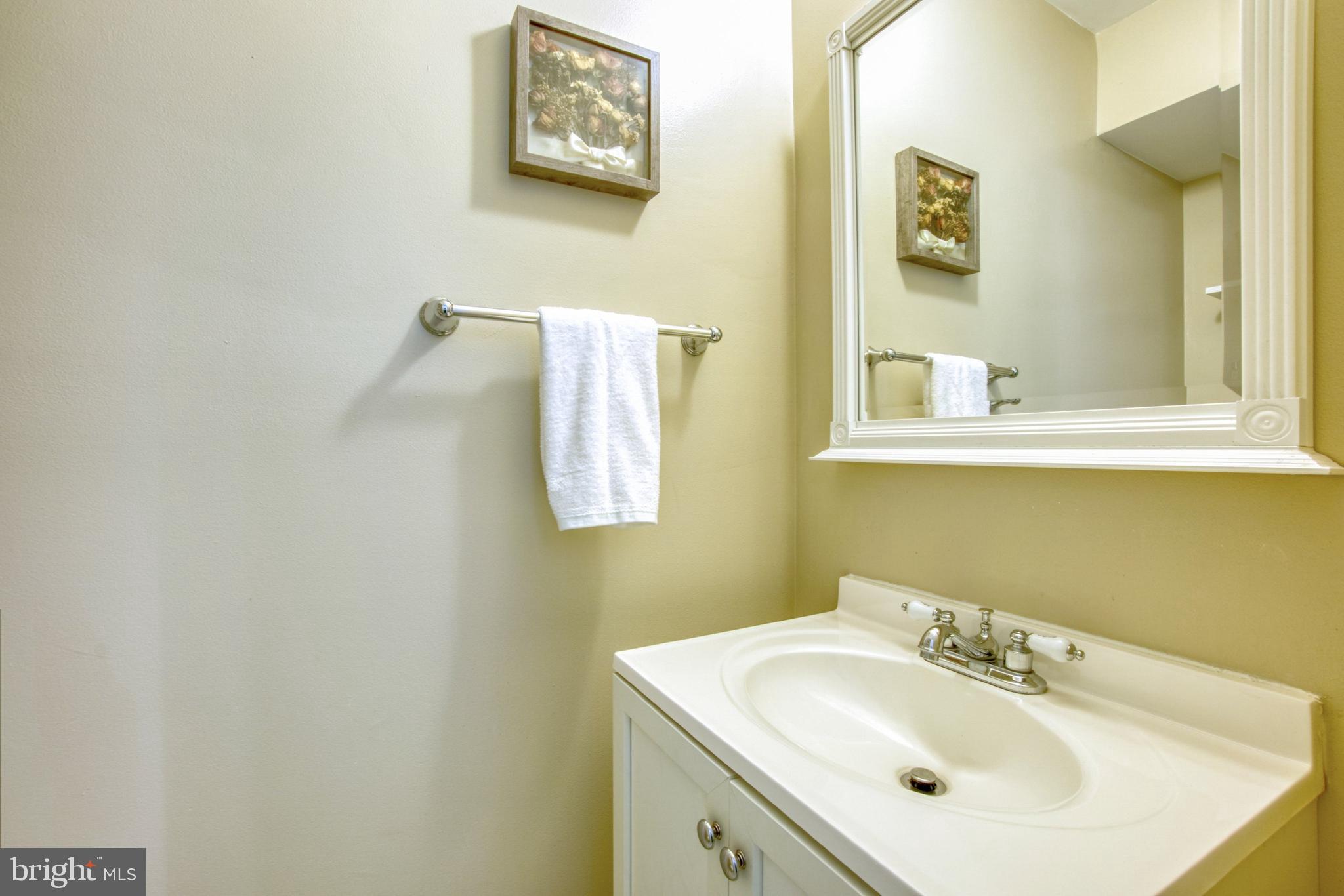 2156 Cartwright Place Reston, VA 20191 - Photo 18 of 35 Helpful on busy mornings! Main bedroom half bath