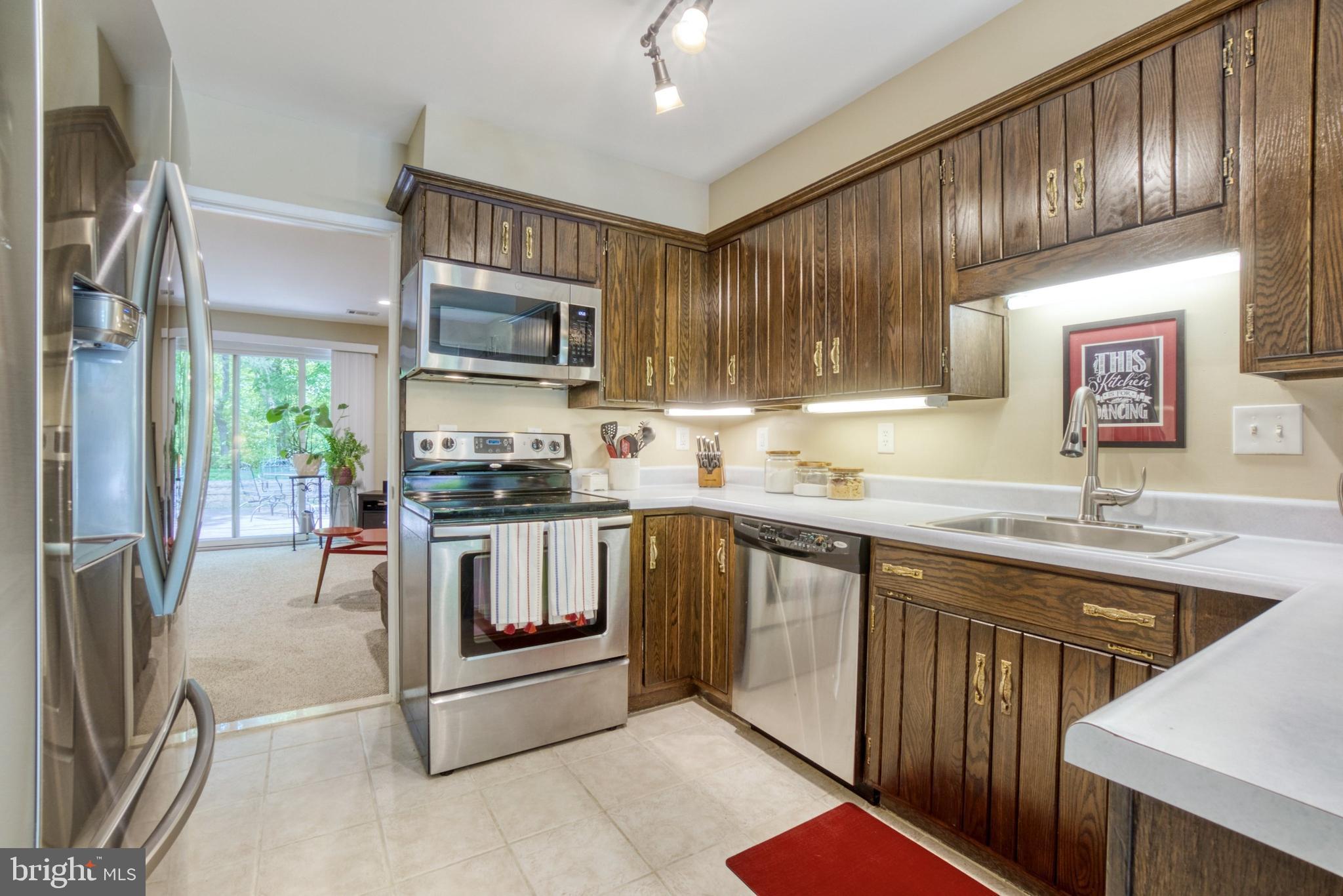 2156 Cartwright Place Reston, VA 20191 - Photo 4 of 35 New stainless steel microwave & refrigerator