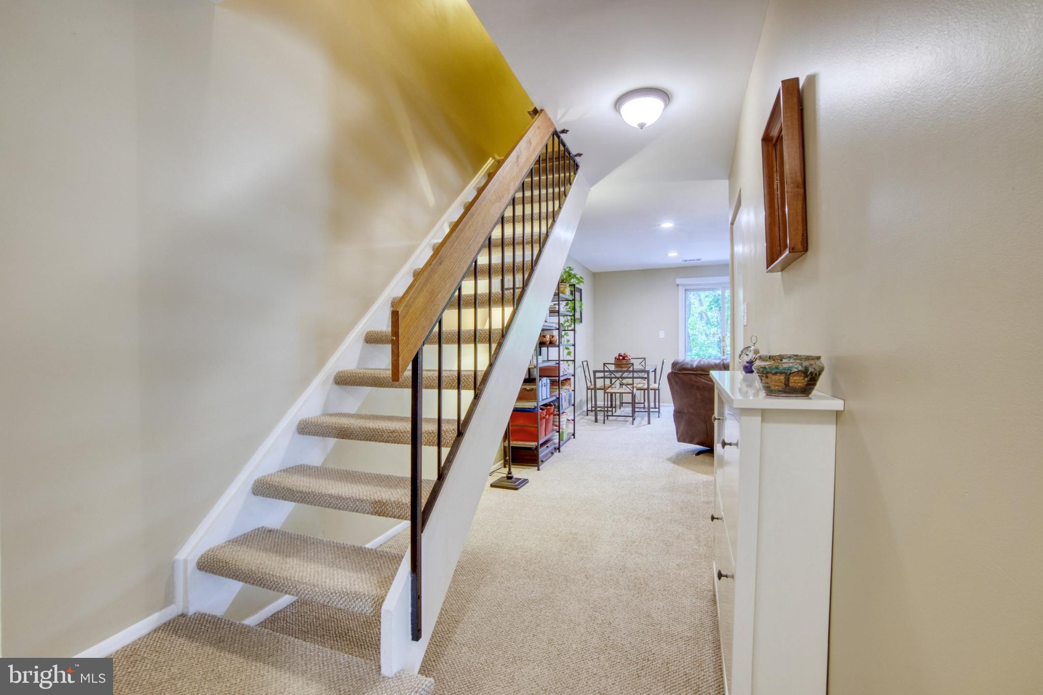 2156 Cartwright Place Reston, VA 20191 - Photo 5 of 35 Floating staircase promotes open, airy feel