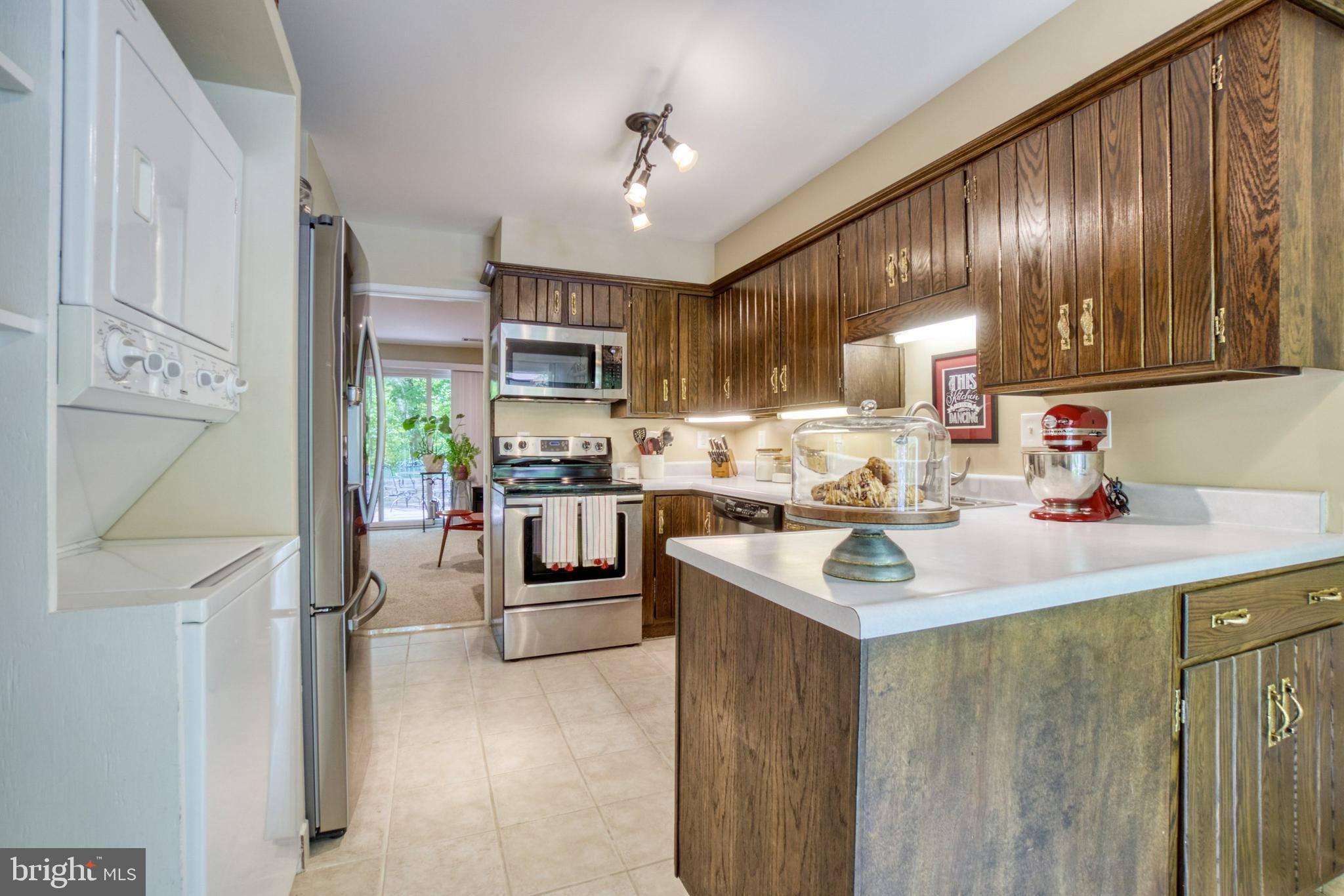 2156 Cartwright Place Reston, VA 20191 - Photo 9 of 35 Peninsula counter space is great for meal prep