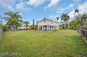 a view of a house with a big yard