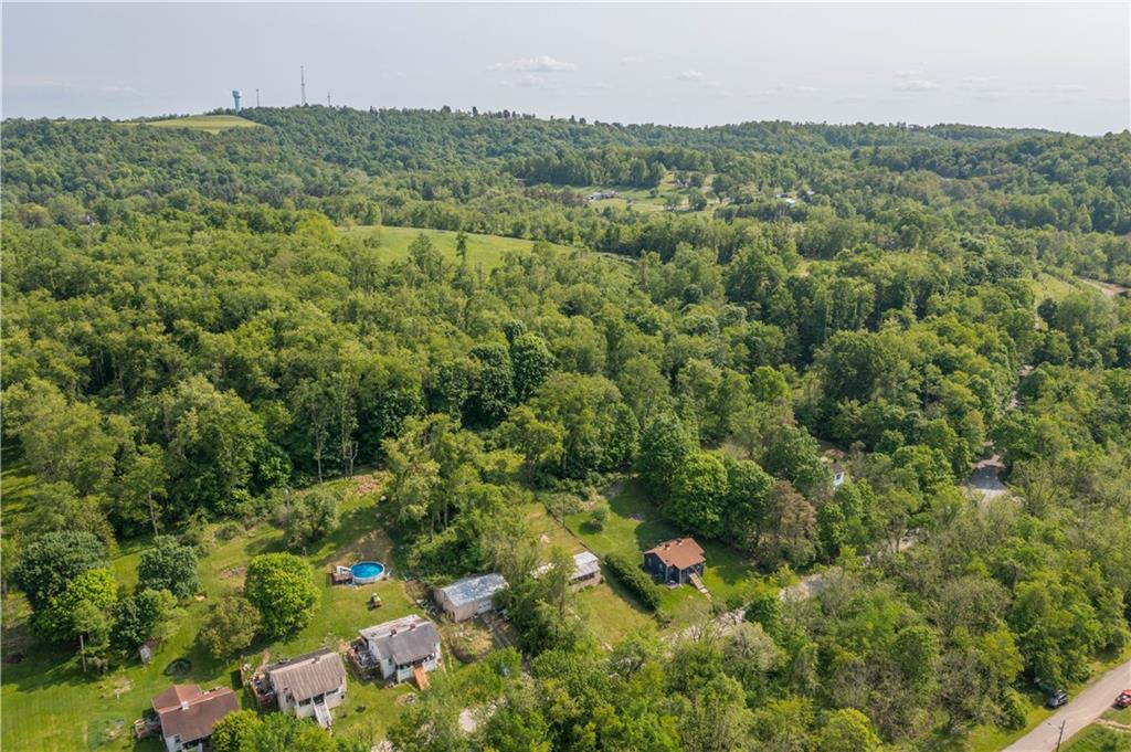 114 Ontario Road Scenery Hill, PA 15360 - Photo 15 of 18 an aerial view of residential houses with outdoor space and trees
