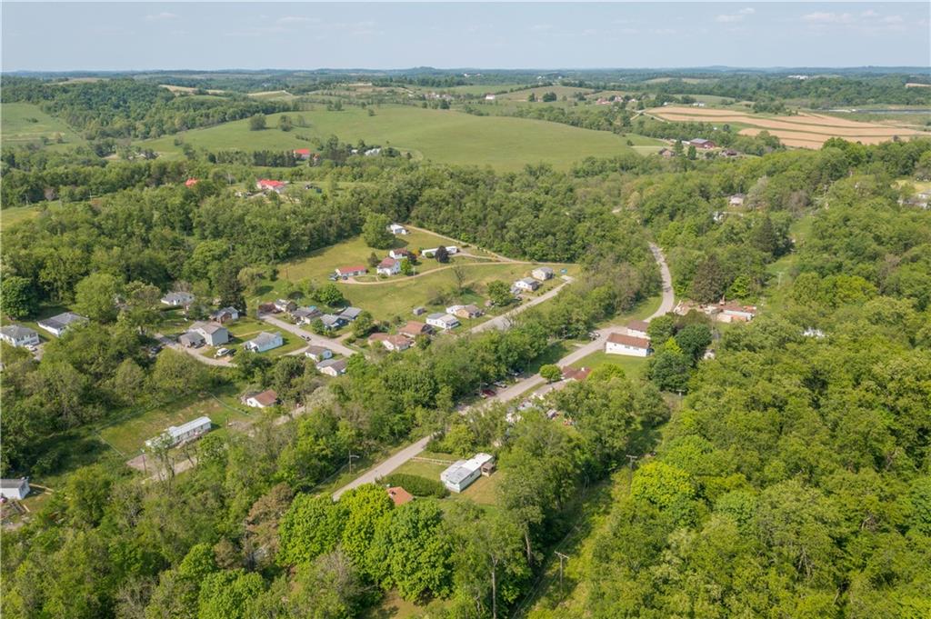 114 Ontario Road Scenery Hill, PA 15360 - Photo 18 of 18 a view of a lake with a yard