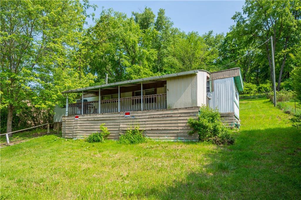 114 Ontario Road Scenery Hill, PA 15360 - Photo 4 of 18 a front view of a house with a yard