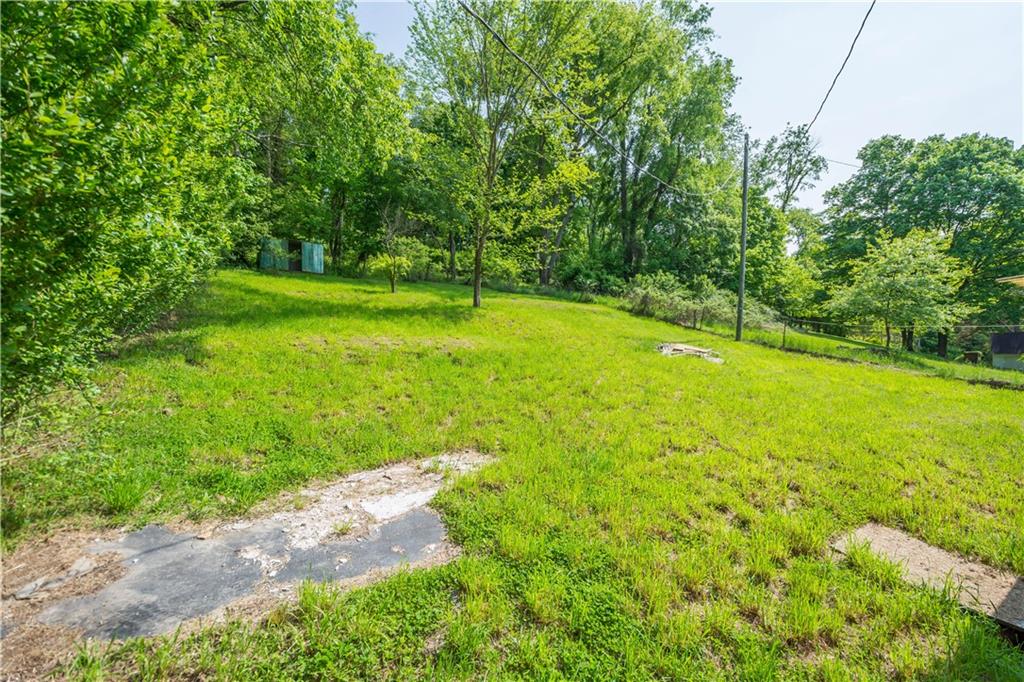 114 Ontario Road Scenery Hill, PA 15360 - Photo 6 of 18 a view of a yard with a trees