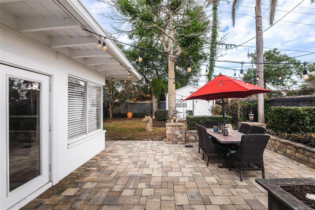 1001 Nottingham Street Orlando, FL 32803 - Photo 35 of 49 a patio with patio table and chairs