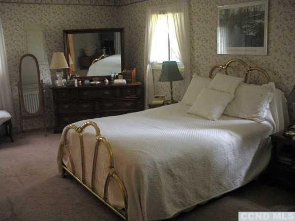 10 Robin Road Kinderhook, NY 12106 - Photo 10 of 10 a bedroom with a bed and window