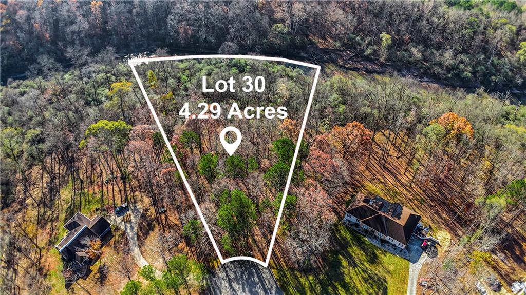 3511 Clear View Trail Stockbridge, GA 30281 - Photo 2 of 5 a sign broad on the side of the road