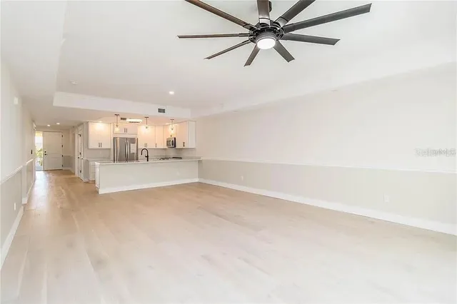 a view of a kitchen with a sink and dishwasher