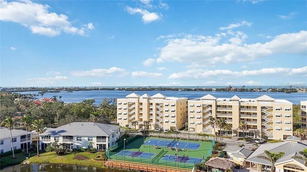 Undisclosed Address Osprey, FL 34229 - Photo 33 of 39 a view of a city that has tall buildings