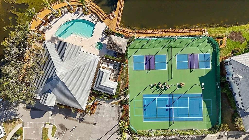 Undisclosed Address Osprey, FL 34229 - Photo 37 of 39 an aerial view of a house with a garden